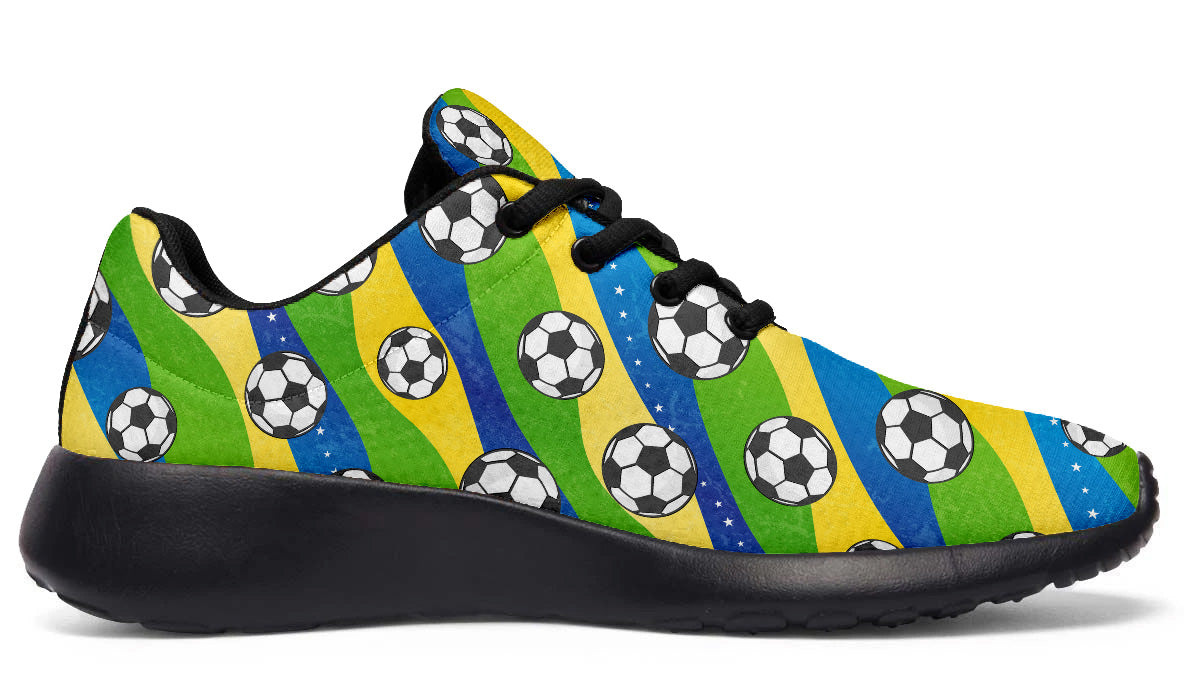 Brazil-inspired sport shoes featuring soccer ball patterns with green, yellow, and blue flag-inspired artwork.