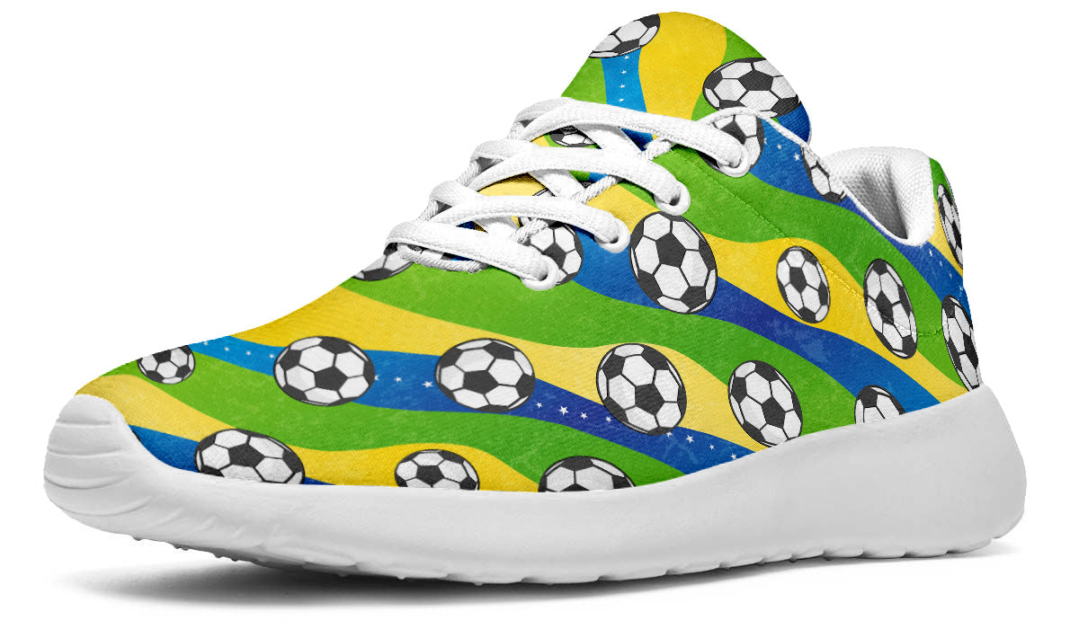 Brazil-inspired sport shoes featuring soccer ball patterns with green, yellow, and blue flag-inspired artwork.