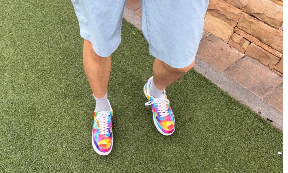 Multicolor Prism Sneakers with grey socks on green grass