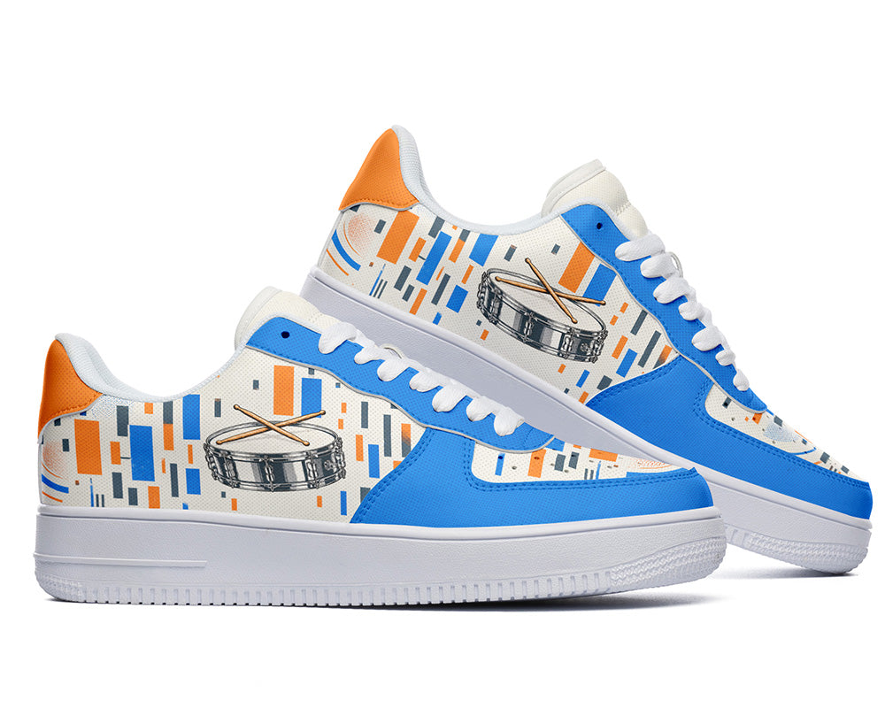Court sneakers in white sole featuring a silver snare drum with drumsticks over blue and orange equalizer block patterns.