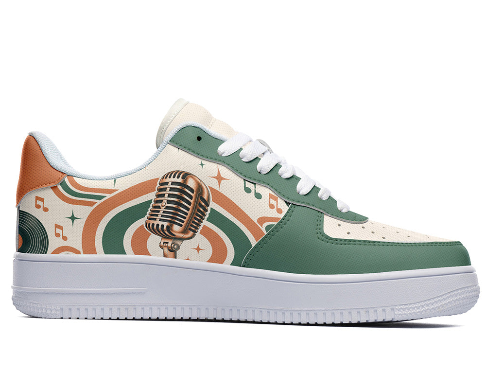 Court sneaker in white sole with a side view featuring a vintage gold microphone illustration over green and orange rainbow wave arches and music notes.