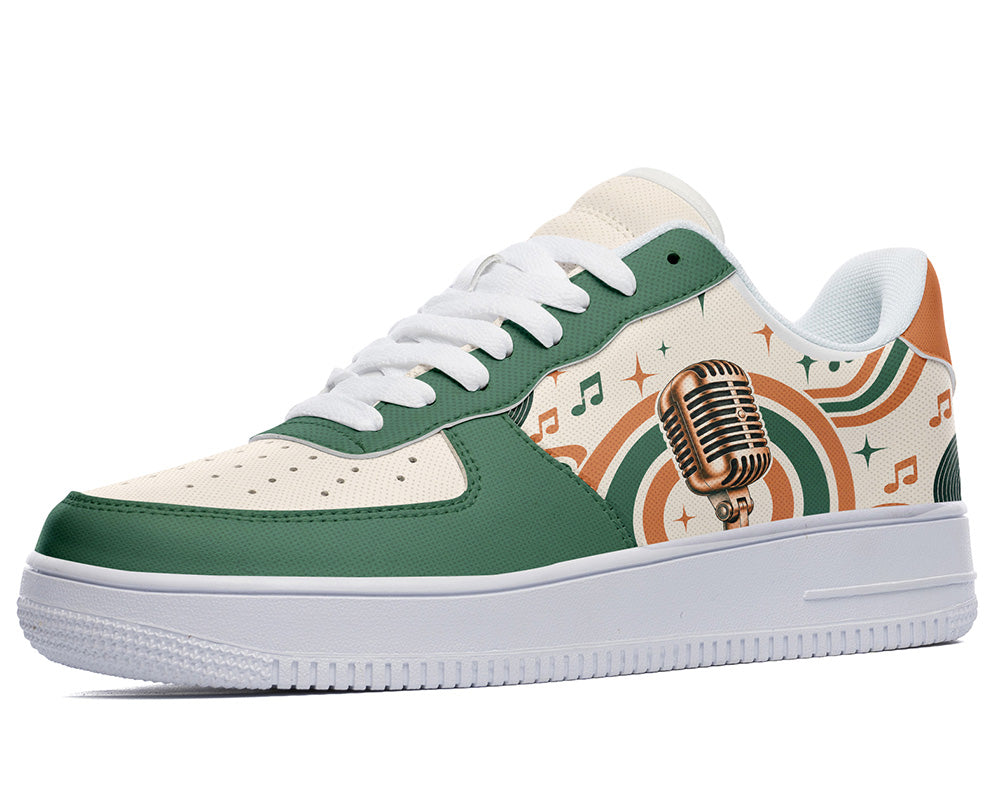 Court sneaker in white sole with a side view featuring a vintage gold microphone illustration over green and orange rainbow wave arches and music notes.