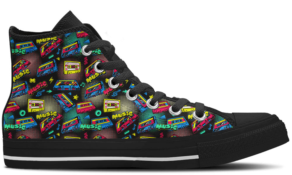 High Top sneaker in black sole with a side view featuring a colorful 80s retro pattern of neon cassette tapes, halftone dots, and music text.